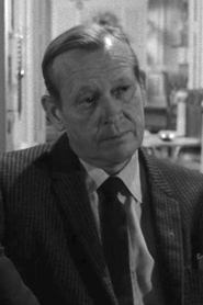 Robert McCord as Man Hearing About Garfield (uncredited) in The Twilight Zone