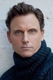 Tony Goldwyn as Virgil Throckmorton in One Battle After Another